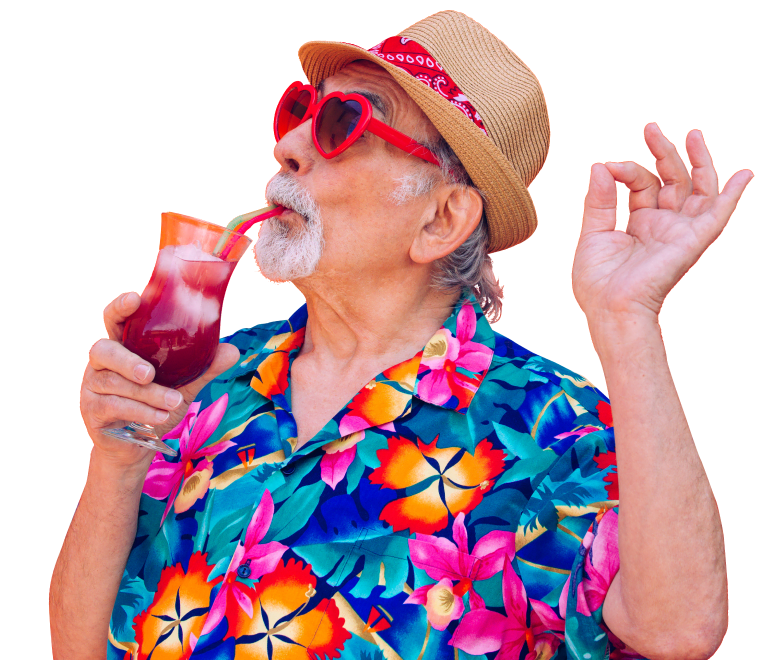 Eccentric elderly man in Hawiian shirt and straw hat sipping a cocktail